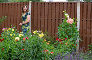Woman with flowers in garden