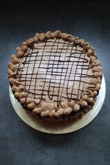 Homemade Chocolate cake with coffee buttercream icing, selective focus