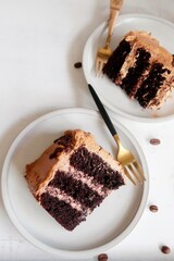 Homemade Chocolate cake with coffee buttercream icing, selective focus