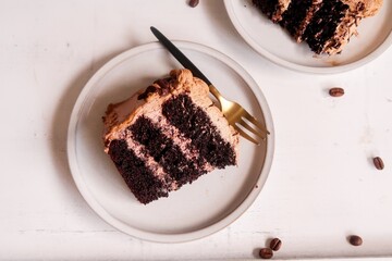 Homemade Chocolate cake with coffee buttercream icing, selective focus