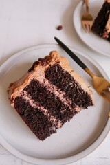 Homemade Chocolate cake with coffee buttercream icing, selective focus