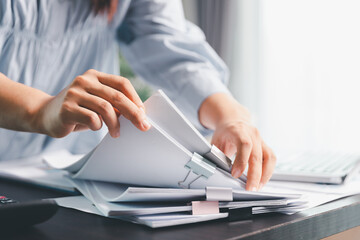 Business woman analyze calculate company financial, tax results office accounting statistics...