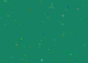 Abstract green background with subtle bokeh effect and light particles