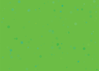 Abstract green background with scattered colorful dots and particles