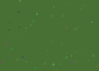 Abstract green background with subtle speckled texture and bokeh effect