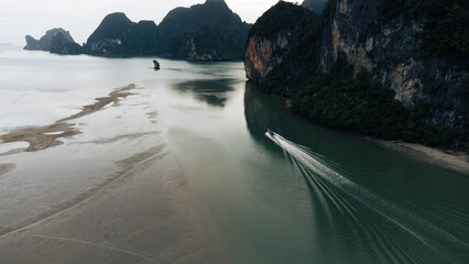Longtail Boat Departing into the Sea at Laem Sak, Krabi