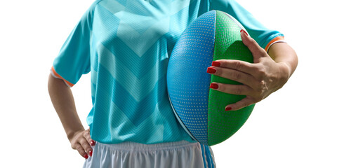 Confident woman in teal sportswear holding a rugby ball and resting a hand on her hip. Concept of gear close-up, focus on grip, sports preparation