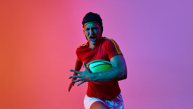 Female rugby athlete sprinting with resolve against vibrant backdrop. Concept of intensity and focus, stylized athlete, game readiness