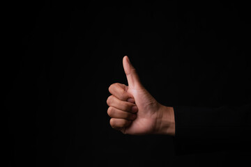 Positive gesture studio setting hand symbol minimalist environment close-up view concept of approval
