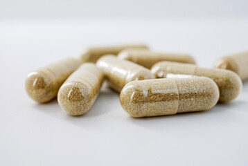 Herbal medicine capsule isolated on white background, Close-up of Herbal medicine capsule