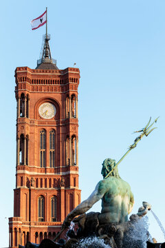 Berlin's town hall or Rotes Rathaus (English: Red City Hall), and the Neptune Fountain right in front