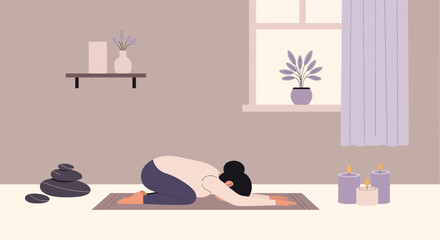 Fototapeta premium Woman Practicing Child's Pose Yoga Position At Her Home Cozy Interior