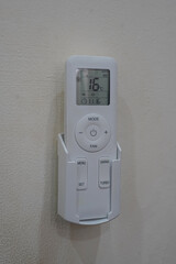 Modern AC Remote Control Displaying 16 Degrees Celsius