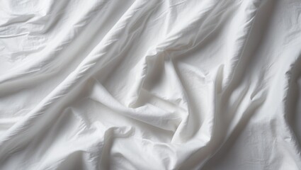 Obraz premium A close-up of crumpled white fabric or cloth with folds and creases.