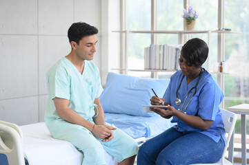 The doctor is taking care of a patient in the ward.	