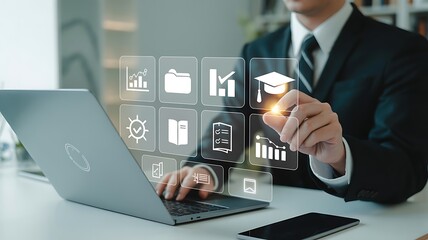 Businessman interacting with digital education icons and charts on a transparent screen
