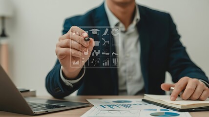 Businessman interacting with a futuristic holographic interface displaying business data