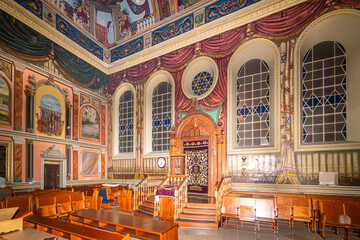 Lviv, Ukraine - March 02 2022: Bright shot of interior of historic Jewish Synagogue or with altar,...