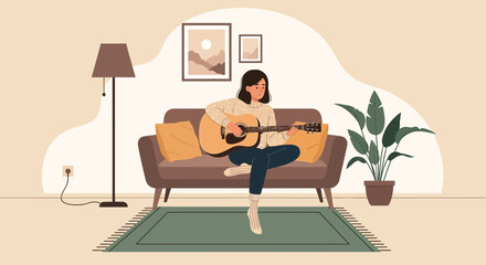 Young Woman Plays Acoustic Guitar On Sofa In A Cozy Home Living Room