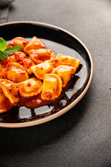 Ravioli beef tomato sauce second course fresh delicious gourmet food background on the table rustic food top view copy space
