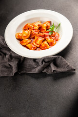 Ravioli beef tomato sauce second course fresh delicious gourmet food background on the table rustic food top view copy space