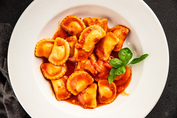Ravioli beef tomato sauce second course fresh delicious gourmet food background on the table rustic food top view copy space