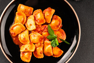 Ravioli beef tomato sauce second course fresh delicious gourmet food background on the table rustic food top view copy space