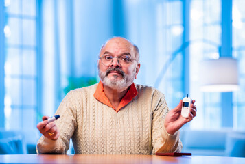 Concerned Indian senior checks sugar level and calls to share bad news about health