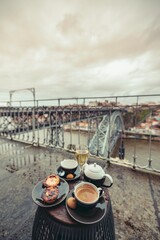 A culinary experience unfolds. Freshly baked Pastel de Nata, rich coffee, and sparkling wine are...