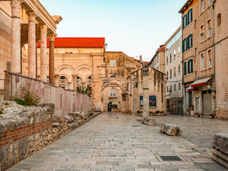 Poljana kraljice Jelene in Split, Croatia, features ancient Roman columns and historic stone...