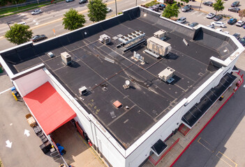 Sunny Daytime Drone Images of an EPDM Roof on a Commercial Building in Raleigh North Carolina