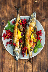 Baked mackerel fish with berries, seafood