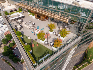 Sunny Daytime Drone Images of TPO Flat Roofs on Commercial and Residential Buildings in Raleigh...