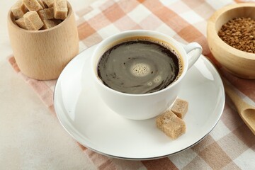 Aromatic instant coffee with sugar on light table, closeup
