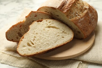 Pieces of fresh bread on table, closeup