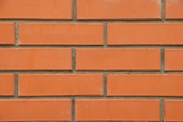Texture of red brick wall as background, closeup