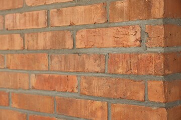 Texture of red brick wall as background, closeup
