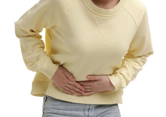 Woman suffering from abdominal pain on white background, closeup
