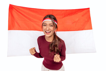 Indonesian southeast asian woman celebrating Indonesia Independence Day on the 17th of August with...