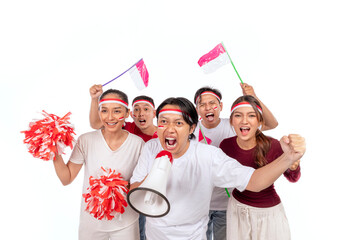 Indonesian southeast asian people celebrate Indonesia Independence Day on 17th of August by holding...