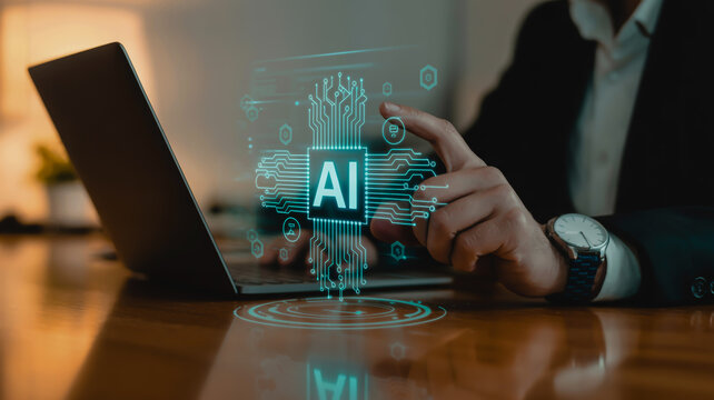 A professional business photo of a person's hand interacting with a holographic AI interface on a wooden desk. - Powered by Adobe