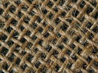 Woven Jute Fiber Texture CloseUp of Natural Burlap Fabric Detail.