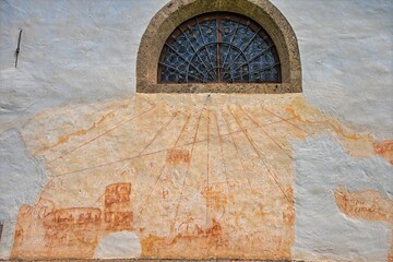 old stone wall with an ancient sundial, Sauris, Friuli-Venezia Giulia, Italy, Europe, 12 July 2025