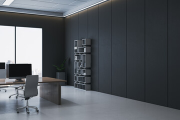 Modern dark corner office interior with sleek desk, stylish furniture, and city view through large...