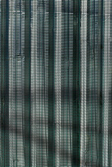 Metal grid on metallic surface, Rio de Janeiro, Brazil