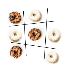 Sweet donut tic-tac-toe game with chocolate and coconut toppings on a white background