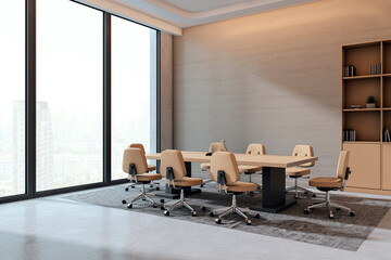 Modern spacious boardroom with beige chairs and wooden meeting table in high-rise office interior...