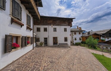 narrow street in the old town, Sauris, Friuli-Venezia Giulia, Italy, Europe, 12 July 2025