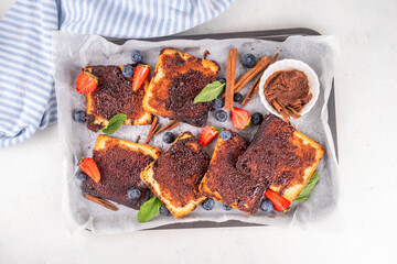Sweet breakfast cinnamon toasts, buttery sugar cinnamon toast with fresh strawberry and blueberry....