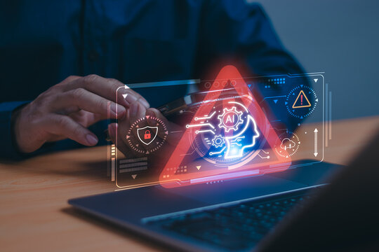 AI technology scam or cyber security warning concept, Man holding mobile while working at desk showing warning about AI technology accessing personal data or internet threats with virtual graphics